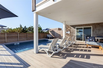 Introducing a rare oceanfront masterpiece in the coveted enclave - photo 4