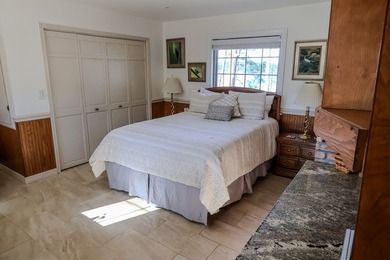 A refined waterfront retreat showcasing custom materials - photo 12