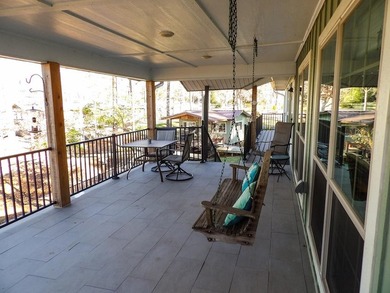 A refined waterfront retreat showcasing custom materials - photo 13