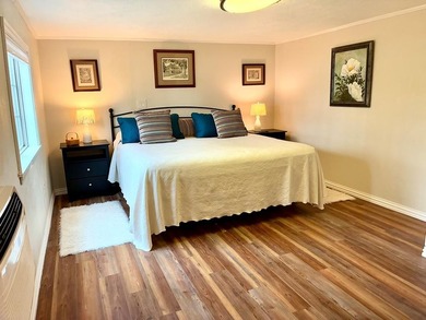 A refined waterfront retreat showcasing custom materials - photo 14
