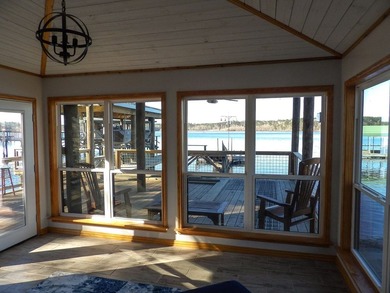 A refined waterfront retreat showcasing custom materials - photo 17