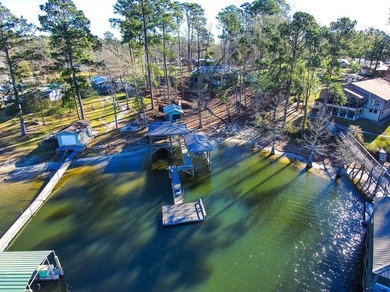 A refined waterfront retreat showcasing custom materials - photo 23