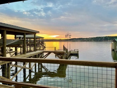 A refined waterfront retreat showcasing custom materials - photo 27