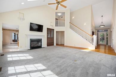Space for all in this custom 1.5 story tucked on a mature wooded - photo 16