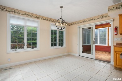 Space for all in this custom 1.5 story tucked on a mature wooded - photo 20
