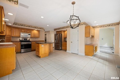 Space for all in this custom 1.5 story tucked on a mature wooded - photo 21