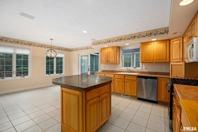 Space for all in this custom 1.5 story tucked on a mature wooded - photo 23