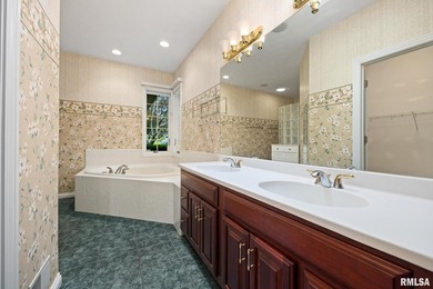 Space for all in this custom 1.5 story tucked on a mature wooded - photo 31