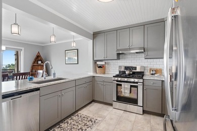 Welcome to one of Charlevoix's most coveted addresses. Perched - photo 8