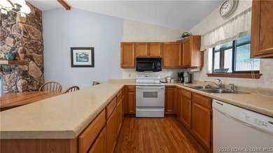 Top floor, vaulted ceiling, panoramic views of Lake of the - photo 16