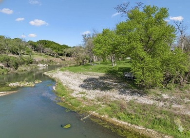 215' of shoreline. Wide yard. Meadow Lake living done right - photo 5