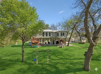 215' of shoreline. Wide yard. Meadow Lake living done right - photo 9