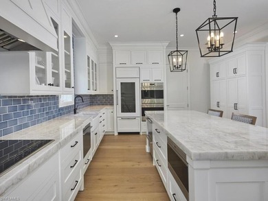 Four blocks to the beach in the heart of Olde Naples, this fully - photo 8