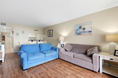 Welcome to Holiday Tower, where coastal convenience and a - photo 11