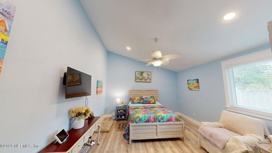 Prime location in Neptune Beach. This adorable coastal home is - photo 11