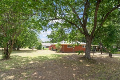 This 3 bedroom, 2 bathroom home sits on a spacious .5-acre - photo 2
