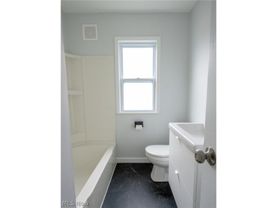 Completely renovated inside and out, this charming cape cod - photo 13