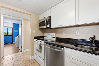 Welcome to Holiday Tower, where coastal convenience and a - photo 16
