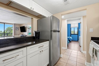 Welcome to Holiday Tower, where coastal convenience and a - photo 18