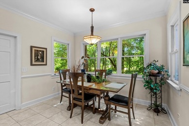 Tucked beneath a canopy of mature hardwoods on a quiet - photo 20