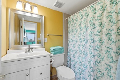 Welcome to Holiday Tower, where coastal convenience and a - photo 21