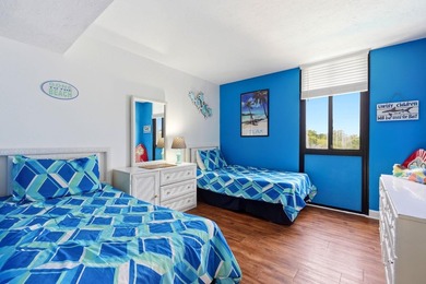 Welcome to Holiday Tower, where coastal convenience and a - photo 25