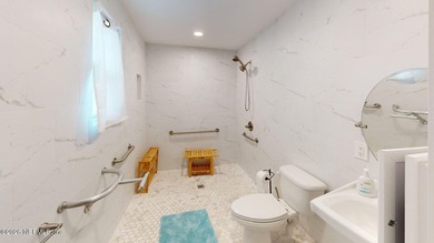 Prime location in Neptune Beach. This adorable coastal home is - photo 25
