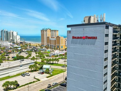 Welcome to Holiday Tower, where coastal convenience and a - photo 37