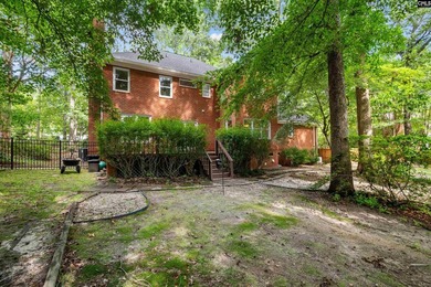 Tucked beneath a canopy of mature hardwoods on a quiet - photo 37