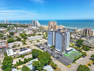Welcome to Holiday Tower, where coastal convenience and a - photo 38