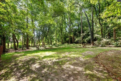 Tucked beneath a canopy of mature hardwoods on a quiet - photo 42