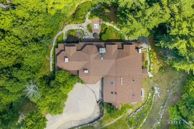 Set along the pristine shores of private Friends Lake in the - photo 11
