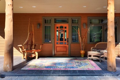 Set along the pristine shores of private Friends Lake in the - photo 15