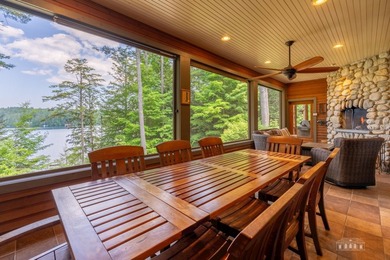 Set along the pristine shores of private Friends Lake in the - photo 19