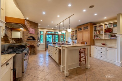 Set along the pristine shores of private Friends Lake in the - photo 26