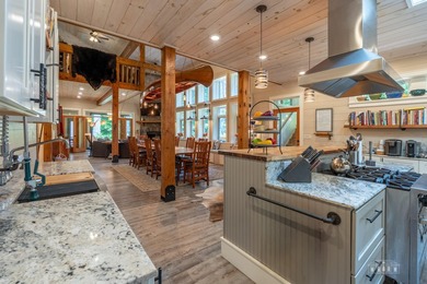 Set along the pristine shores of private Friends Lake in the - photo 37