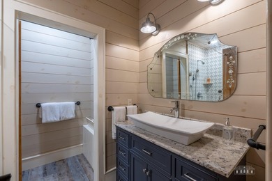 Set along the pristine shores of private Friends Lake in the - photo 45