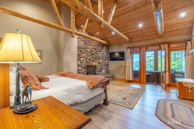 Set along the pristine shores of private Friends Lake in the - photo 48