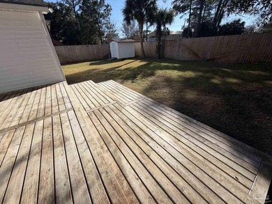 This well-kept 4-bedroom, 2-bath home, has a warm cottage - photo 8