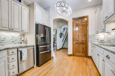 The blending of spectacular lake views and custom French Country - photo 11