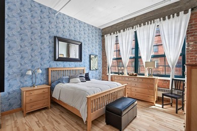 Rare 5th-floor corner loft at American Trio Lofts, filled with - photo 11