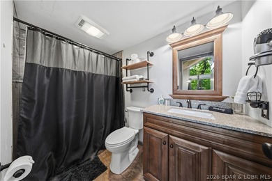 Tucked among the trees in the sought-after Tan-Tar-A Estates - photo 18
