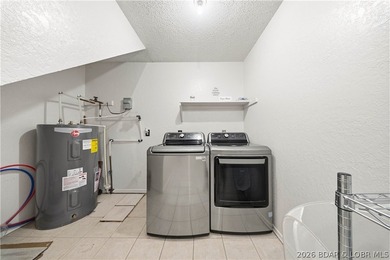 Tucked among the trees in the sought-after Tan-Tar-A Estates - photo 24