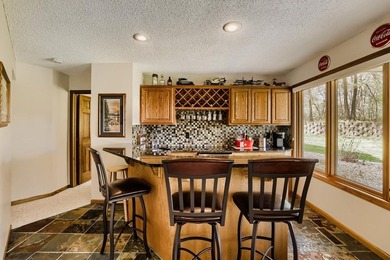 Experience refined riverfront living with this exceptional - photo 11