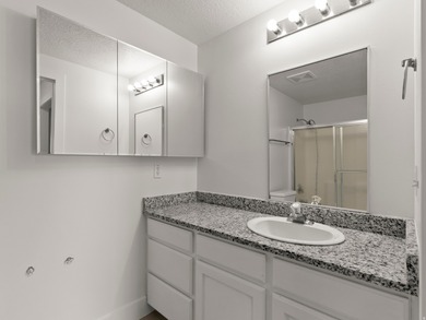 SANDY CONDO....2 Bedroom/2 Bathrooms in secure building with