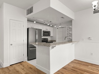 SANDY CONDO....2 Bedroom/2 Bathrooms in secure building with