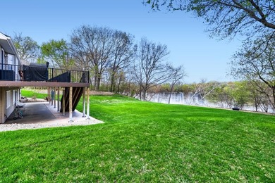 Experience refined riverfront living with this exceptional - photo 27