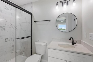 Experience coastal luxury with this stunning 3-bedroom - photo 31