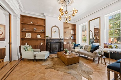 This exceptional 25-foot-wide single-family brownstone sits in - photo 3
