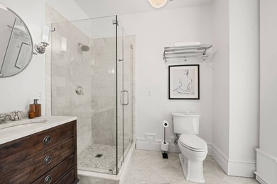 This exceptional 25-foot-wide single-family brownstone sits in - photo 10